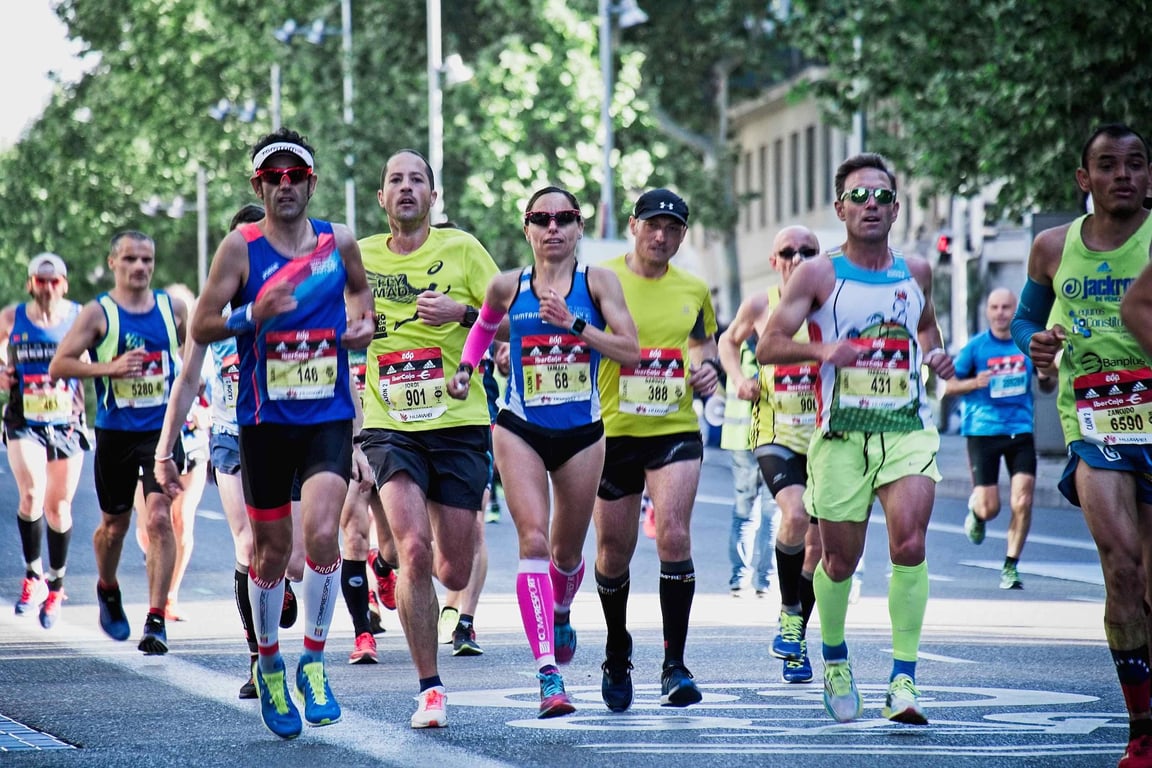 A group of professional runners in the middle of the race.